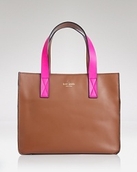 This polished kate spade new york handbag is styled in bold, blocked leather for an on-trend take on a classic shape. The strap slips comfortably over the shoulder and the lined interior features 3 pockets. This polished kate spade new york handbag is styled in bold, blocked leather for an on-trend take on a classic shape. The strap slips comfortably over the shoulder and the lined interior features 3 pockets.