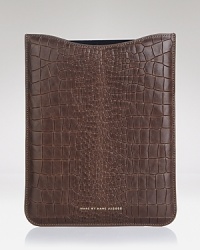 Refined leather is treated to the appearance of alligator skin for a polished and urbane home for your favorite device. Refined leather is treated to the appearance of alligator skin for a polished and urbane home for your favorite device.