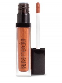 Instantly plumps, hydrates and moisturized for healthier, sexy lips. A refreshing, cooling effect builds up over 20 minutes to plump lips, lasting up to two hours. Adds a slight tint to the lips for natural looking lips. Apply liberally to the lips using the applicator or the Laura Mercier Lip Colour Brush. 0.18 oz. Instantly plumps, hydrates and moisturized for healthier, sexy lips. A refreshing, cooling effect builds up over 20 minutes to plump lips, lasting up to two hours. Adds a slight tint to the lips for natural looking lips. Apply liberally to the lips using the applicator or the Laura Mercier Lip Colour Brush. 0.18 oz.
