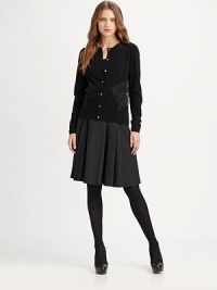 An old-world inspired design with an exposed zipper and buckle tab details for a modern look. Wide banded waist with adjustable buckle tabs and crossover detailsExposed back zip closurePleated detailsA-line silhouetteSide slash pocketsPoly stretch satin liningAbout 30¾ long95% wool/5% elastaneDry cleanImported Model shown is 5'9½ (176cm) wearing US size 4. An old-world inspired design with an exposed zipper and buckle tab details for a modern look. Wide banded waist with adjustable buckle tabs and crossover detailsExposed back zip closurePleated detailsA-line silhouetteSide slash pocketsPoly stretch satin liningAbout 30¾ long95% wool/5% elastaneDry cleanImported Model shown is 5'9½ (176cm) wearing US size 4.
