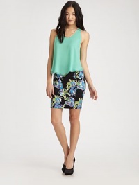 A cropped shell-top of sumptuous matte silk, slightly flared with a high-low hem.High scoopneckSleevelessHem is shorter in backAbout 24 from shoulder to hemSilkDry cleanImportedModel shown is 5'10 (177cm) wearing US size Small. A cropped shell-top of sumptuous matte silk, slightly flared with a high-low hem.High scoopneckSleevelessHem is shorter in backAbout 24 from shoulder to hemSilkDry cleanImportedModel shown is 5'10 (177cm) wearing US size Small.