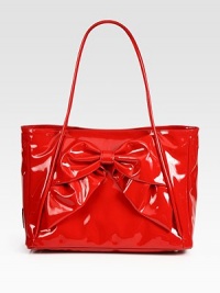 Patent leather carryall finished with a chic front bow.Double top handles, 10 dropTop snap closureProtective metal feetOne inside zip pocketTwo inside open pocketsCotton lining15W X 11H X 7DMade in Italy Patent leather carryall finished with a chic front bow.Double top handles, 10 dropTop snap closureProtective metal feetOne inside zip pocketTwo inside open pocketsCotton lining15W X 11H X 7DMade in Italy