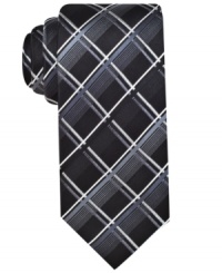 A funky grid pattern gives this silk tie from Alfani a uniquely handsome look. A funky grid pattern gives this silk tie from Alfani a uniquely handsome look.