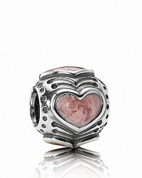 A finely detailed sterling silver charm with heart motifs in rose enamel. By PANDORA. A finely detailed sterling silver charm with heart motifs in rose enamel. By PANDORA.