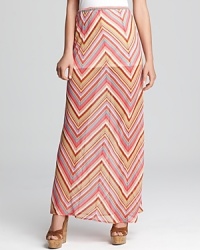 This breezy Element maxi skirt delivers fresh summer style with vibrant stripes and subtle sheerness from the mid-thigh down. This breezy Element maxi skirt delivers fresh summer style with vibrant stripes and subtle sheerness from the mid-thigh down.