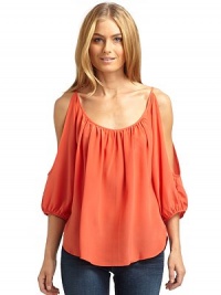 THE LOOKScoopneckCutout shouldersThree-quarter length sleeves with elastic cuffsCurved hemTHE FITAbout 25 from shoulder to hemTHE MATERIALSilkCARE & ORIGINDry cleanMade in USAModel shown is 5'8 (172½cm) wearing US size Small. THE LOOKScoopneckCutout shouldersThree-quarter length sleeves with elastic cuffsCurved hemTHE FITAbout 25 from shoulder to hemTHE MATERIALSilkCARE & ORIGINDry cleanMade in USAModel shown is 5'8 (172½cm) wearing US size Small.