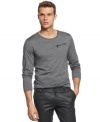 Here's the scoop: low necklines are in. Don the coolest current trend with this t-shirt from Calvin Klein. (Clearance)