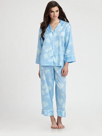 Romantic flowers decorate this classic pajama set in ultra-soft cotton sateen. Notch collarDropped shouldersLong sleevesButton frontContrast piping at neckline and cuffsElasticized waistbandInseam, about 26CottonMachine washImported Romantic flowers decorate this classic pajama set in ultra-soft cotton sateen. Notch collarDropped shouldersLong sleevesButton frontContrast piping at neckline and cuffsElasticized waistbandInseam, about 26CottonMachine washImported