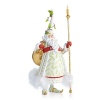 Dressed in dramatic white, green and gold, Candlelight Santa by Patience Brewster has a garland wrapped hat and a candle in his staff. His golden bag is packed with toys for the midnight ride.