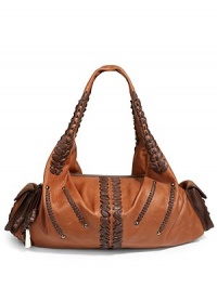 THE LOOKShoulder straps with contrast leaf detailsContrast leather leaf and braided detailsTop zip closure with tassel pull and horn accentsTwo outside magnetic snap flap pocketsContrast pipingTwo outside snap flap pockets with leaf accentsOne inside zip pocketTwo inside open pocketsInside logo detailTHE MEASUREMENTShoulder straps, 10 drop18½W X 9H X 5DTHE MATERIALLeatherLogo printed liningORIGINImported THE LOOKShoulder straps with contrast leaf detailsContrast leather leaf and braided detailsTop zip closure with tassel pull and horn accentsTwo outside magnetic snap flap pocketsContrast pipingTwo outside snap flap pockets with leaf accentsOne inside zip pocketTwo inside open pocketsInside logo detailTHE MEASUREMENTShoulder straps, 10 drop18½W X 9H X 5DTHE MATERIALLeatherLogo printed liningORIGINImported