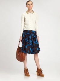 Rendered in a retro floral print, this silk skirt is accented by cascading ruffles and an exposed back zipper. Wide waistbandExposed back zipperAbout 24 longSilkDry cleanImportedModel shown is 5'10 (177cm) wearing US size 2. Rendered in a retro floral print, this silk skirt is accented by cascading ruffles and an exposed back zipper. Wide waistbandExposed back zipperAbout 24 longSilkDry cleanImportedModel shown is 5'10 (177cm) wearing US size 2.