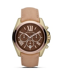 An elegant choice on duty or off. This two-tone watch from MICHAEL Michael Kors boasts a boldly sized face, roman numeral indexes and a distinctive leather strap. An elegant choice on duty or off. This two-tone watch from MICHAEL Michael Kors boasts a boldly sized face, roman numeral indexes and a distinctive leather strap.