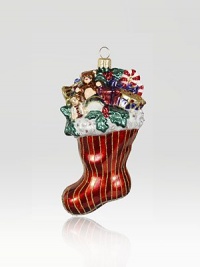 The Heritage of Jay Strongwater began as the bejeweled frame with beautiful stone settings and scrolls, becoming the source of inspiration for this season's new glass ornament collection. This ornament is mouth blown and decorated in Poland with a wonderful team of old world craftsmen. Detailed with crystals, hand applied jewel tone colors and scrolls as if it were a fine piece of jewelry.GlassCrystalMouth blownHand-painted and hand-set5.5H X 3W X 1.5DImported The Heritage of Jay Strongwater began as the bejeweled frame with beautiful stone settings and scrolls, becoming the source of inspiration for this season's new glass ornament collection. This ornament is mouth blown and decorated in Poland with a wonderful team of old world craftsmen. Detailed with crystals, hand applied jewel tone colors and scrolls as if it were a fine piece of jewelry.GlassCrystalMouth blownHand-painted and hand-set5.5H X 3W X 1.5DImported