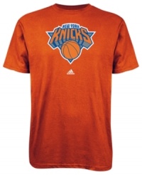 Sport your favorite team's winning spirit in this New York Knicks NBA t-shirt from adidas. Sport your favorite team's winning spirit in this New York Knicks NBA t-shirt from adidas.