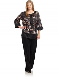 THE LOOKDot and swirl printPullover styleRound necklineThree-quarter length sleevesTie-inspired detailBust dartsSide zip closureTHE FITAbout 31 from shoulder to hemTHE MATERIAL55% silk/45% cottonCARE & ORIGINHand washImported THE LOOKDot and swirl printPullover styleRound necklineThree-quarter length sleevesTie-inspired detailBust dartsSide zip closureTHE FITAbout 31 from shoulder to hemTHE MATERIAL55% silk/45% cottonCARE & ORIGINHand washImported
