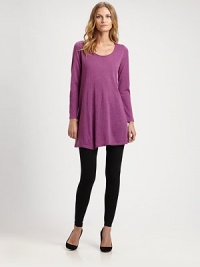 Offering a more elongated silhouette, a brilliant merino wool tunic with a feminine neckline. ScoopneckLong sleevesPull-on styleAbout 33 from shoulder to hemMerino woolDry cleanImported of Italian fabric Model shown is 5'10½ (179cm) wearing US size Small. Offering a more elongated silhouette, a brilliant merino wool tunic with a feminine neckline. ScoopneckLong sleevesPull-on styleAbout 33 from shoulder to hemMerino woolDry cleanImported of Italian fabric Model shown is 5'10½ (179cm) wearing US size Small.