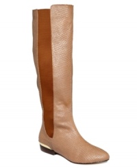 Cool-weather style that can't be beat. The Top Notch flat boots by ABS by Allen Schwartz feature contrasting elastic detail on the side and metallic hardware on the heel. Cool-weather style that can't be beat. The Top Notch flat boots by ABS by Allen Schwartz feature contrasting elastic detail on the side and metallic hardware on the heel.