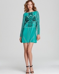 In a tribal-inspired geometric print, Tibi's emerald silk dress a trend-right look on a timelessly ladylike shift silhouette. In a tribal-inspired geometric print, Tibi's emerald silk dress a trend-right look on a timelessly ladylike shift silhouette.