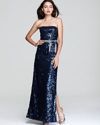 In shimmering, inky sequins, BCBGMAXAZRIA's sparkling dress lends a dazzling look to the evening's events. In shimmering, inky sequins, BCBGMAXAZRIA's sparkling dress lends a dazzling look to the evening's events.