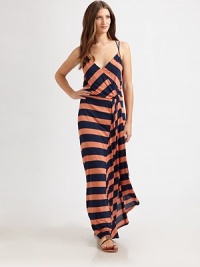 Bold stripes converge on this floor-sweeping silhouette of fluid modal finished with a cascading front ruffle.Silk woven strapsCrossover V necklineBlouson bodiceElastic waistbandCriss-cross back detailAbout 45 from natural waistModalDry cleanImportedModel shown is 5'9 (175cm) wearing US size Small. Bold stripes converge on this floor-sweeping silhouette of fluid modal finished with a cascading front ruffle.Silk woven strapsCrossover V necklineBlouson bodiceElastic waistbandCriss-cross back detailAbout 45 from natural waistModalDry cleanImportedModel shown is 5'9 (175cm) wearing US size Small.