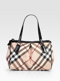 A lady-like design finished with inverted pleats, crafted from signature check canvas with sleek patent leather trim.Double top handles, 7½ dropMagnetic snap closureProtective metal feetTwo inside zip compartmentsOne inside zip pocketTwo inside open pocketsCotton lining13½W X 10H X 4½DMade in Italy A lady-like design finished with inverted pleats, crafted from signature check canvas with sleek patent leather trim.Double top handles, 7½ dropMagnetic snap closureProtective metal feetTwo inside zip compartmentsOne inside zip pocketTwo inside open pocketsCotton lining13½W X 10H X 4½DMade in Italy