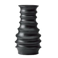 Hand-carved from a single piece of mango wood, this sensually rippled vase is crafted from a renewable, sustainable resource for the ultimate in natural beauty. Hand-carved from a single piece of mango wood, this sensually rippled vase is crafted from a renewable, sustainable resource for the ultimate in natural beauty.