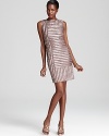 Crafted in ribbon stripes trimmed with chiffon, Aidan Mattox's mixed media dress feels modern with asymmetric paneling.