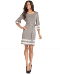 A crochet-inspired lace inset at the cuffs and hem of NY Collection's dress is a radiant touch to this soft sweater dress. A crochet-inspired lace inset at the cuffs and hem of NY Collection's dress is a radiant touch to this soft sweater dress.