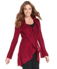 This soft, feminine sweater from NY Collection is a gorgeous fall layering piece with its pointelle detail and beautiful bell sleeves. This soft, feminine sweater from NY Collection is a gorgeous fall layering piece with its pointelle detail and beautiful bell sleeves.