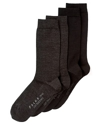 Slip on Falke's perfect-fit socks-rendered in soft cotton and warming merino wool-for total foot bliss. Slip on Falke's perfect-fit socks-rendered in soft cotton and warming merino wool-for total foot bliss.