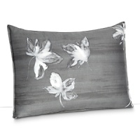 Large floral blossoms in watercolor shades of white and grey dance across a dark grey background on duvets and shams in this collection by Vera Wang. Reverse is a suiting pinstripe. Large floral blossoms in watercolor shades of white and grey dance across a dark grey background on duvets and shams in this collection by Vera Wang. Reverse is a suiting pinstripe.