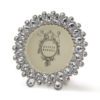 This handcrafted frame from Olivia Riegel dazzles with faux stones reminiscent of Elizabethan-era jewels. This handcrafted frame from Olivia Riegel dazzles with faux stones reminiscent of Elizabethan-era jewels.