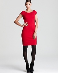 Stop traffic from commute to corner office in this DKNY sheath dress, boasting sleek tailoring and clean lines for a minimalist statement. Stop traffic from commute to corner office in this DKNY sheath dress, boasting sleek tailoring and clean lines for a minimalist statement.