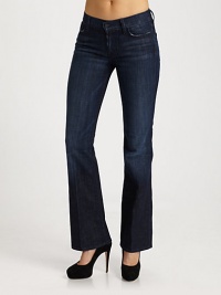 The famous 7 style with a mid rise waist and signature stitched back pockets.THE FITStraight waistband Standard bootcut proportion Rise, about 9 Inseam about 33¾THE DETAILSFront button and zip closure Belt loops Five-pocket style Italian cotton/spandex; machine wash Made in USA The famous 7 style with a mid rise waist and signature stitched back pockets.THE FITStraight waistband Standard bootcut proportion Rise, about 9 Inseam about 33¾THE DETAILSFront button and zip closure Belt loops Five-pocket style Italian cotton/spandex; machine wash Made in USA
