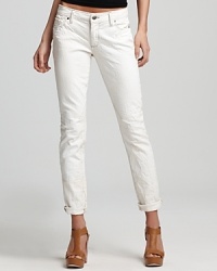 These Paige Denim skinny jeans tout an off-white wash and allover crinkled effect for a cool lived-in feel. These Paige Denim skinny jeans tout an off-white wash and allover crinkled effect for a cool lived-in feel.