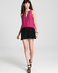 This Parker dress in a cool color block style is the perfect mix of bold and basic. Dress it up with heels for a party or wear it with flat sandals for a day of summer street shopping. This Parker dress in a cool color block style is the perfect mix of bold and basic. Dress it up with heels for a party or wear it with flat sandals for a day of summer street shopping.