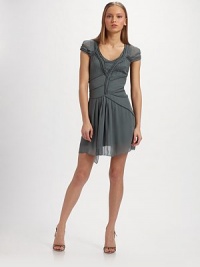 Swirls of tonal piping adorn this chiffon creation, detailed with cap sleeves, a sultry cutout back and frayed self-tie.Scoopneck Cap sleeves Allover tonal piping Center front pleats Cutout back Frayed tie-back About 32 from shoulder to hem Tonal rayon tank underlay Rayon; dry clean Made in Italy Swirls of tonal piping adorn this chiffon creation, detailed with cap sleeves, a sultry cutout back and frayed self-tie.Scoopneck Cap sleeves Allover tonal piping Center front pleats Cutout back Frayed tie-back About 32 from shoulder to hem Tonal rayon tank underlay Rayon; dry clean Made in Italy