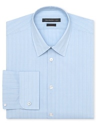 Handsome tonal stripes adorn this crisp cotton dress shirt for a polished look from John Varvatos Star USA. Handsome tonal stripes adorn this crisp cotton dress shirt for a polished look from John Varvatos Star USA.
