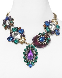 Big bold gemstones, in an array of hues, are prettily arranged on this Cara bib necklace. It's statement piece perfection. Big bold gemstones, in an array of hues, are prettily arranged on this Cara bib necklace. It's statement piece perfection.