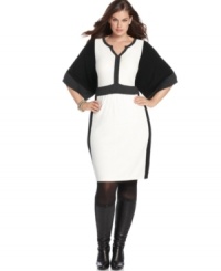 Catch onto the colorblocked trend with Spense's three-quarter sleeve plus size sweater dress, accentuated by a banded waist. (Clearance) Catch onto the colorblocked trend with Spense's three-quarter sleeve plus size sweater dress, accentuated by a banded waist. (Clearance)