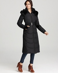 Bring maximum warmth to your winter looks with this long puffer coat from Via Spiga. Quilting and belted waist bring figure-flattering style and a plush fur collar with pom poms lends a luxe finish. Bring maximum warmth to your winter looks with this long puffer coat from Via Spiga. Quilting and belted waist bring figure-flattering style and a plush fur collar with pom poms lends a luxe finish.