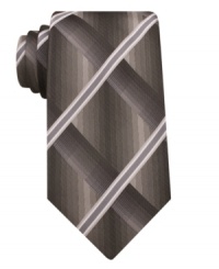A visually textured tie from John Ashford gives your dress look instant depth. A visually textured tie from John Ashford gives your dress look instant depth.