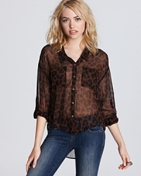 Tap into your sheer animal instincts with this perfectly on-trend Free People top. Tap into your sheer animal instincts with this perfectly on-trend Free People top.