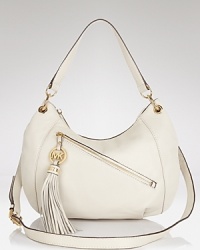 Versatile style goes luxe with this convertible shoulder bag from MICHAEL Michael Kors. This leather purse boats a removable shoulder strap to keep pace with day-to-night style demands. Versatile style goes luxe with this convertible shoulder bag from MICHAEL Michael Kors. This leather purse boats a removable shoulder strap to keep pace with day-to-night style demands.