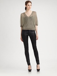 Rich and relaxed with a glowing sheen, this slouchy, silky open knit is both chunky and delightfully sheer.Ribbed V necklineElbow-length sleeves with ribbed trimRibbed waistAbout 21 from shoulder to hemRayon/metallicDry cleanImportedSIZE & FITModel shown is 5'9 (175cm) wearing US size Small. Rich and relaxed with a glowing sheen, this slouchy, silky open knit is both chunky and delightfully sheer.Ribbed V necklineElbow-length sleeves with ribbed trimRibbed waistAbout 21 from shoulder to hemRayon/metallicDry cleanImportedSIZE & FITModel shown is 5'9 (175cm) wearing US size Small.