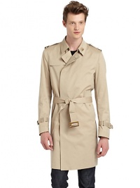THE LOOKShirt collarConcealed front button and hook closureLong sleeves with belted detailEpaulettesGun flapsSelf-tie beltSide button flap pocketsBack gun flapBack vented hemTwo inside button pocketsTHE MATERIAL76% cotton/22% nylon/2% elastanePartially linedCARE & ORIGINMachine washMade in Italy THE LOOKShirt collarConcealed front button and hook closureLong sleeves with belted detailEpaulettesGun flapsSelf-tie beltSide button flap pocketsBack gun flapBack vented hemTwo inside button pocketsTHE MATERIAL76% cotton/22% nylon/2% elastanePartially linedCARE & ORIGINMachine washMade in Italy