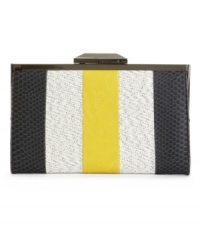 Add this chic clutch to your outfit for your next night on the town. A canvas exterior makes it casual enough for dinner and drinks, while a sleek snakeskin trim will easily take it to after hours.