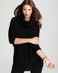 Approach your layers with luxe style sense in a sumptuous DKNY sweater with a statement cowl neckline. Approach your layers with luxe style sense in a sumptuous DKNY sweater with a statement cowl neckline.