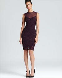 In richly hued lace, Nicole Miller's after-hours dress lends allure with an illusion neckline. In richly hued lace, Nicole Miller's after-hours dress lends allure with an illusion neckline.