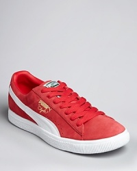 In 1968, Walt Clyde Frazier asked for a shoe wide enough to play basketball in and colorful enough to make a statement. He got his wish. Now, this classic from the archive has been revamped in rich premium suede with cursive gold-foiled Clyde script for your everyday wardrobe, a vivid sneaker with vintage appeal from PUMA. In 1968, Walt Clyde Frazier asked for a shoe wide enough to play basketball in and colorful enough to make a statement. He got his wish. Now, this classic from the archive has been revamped in rich premium suede with cursive gold-foiled Clyde script for your everyday wardrobe, a vivid sneaker with vintage appeal from PUMA.